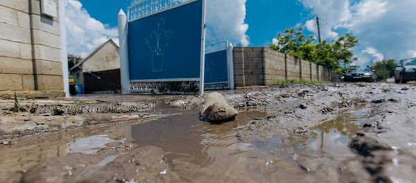 Urmările ploilor torențiale și inundațiilor în raionul Ialoveni. - Sputnik Молдова