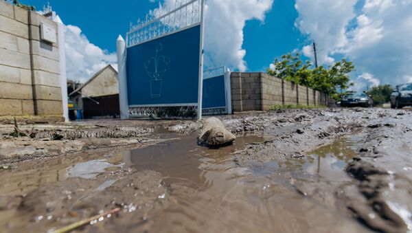 Urmările ploilor torențiale și inundațiilor în raionul Ialoveni. - Sputnik Молдова