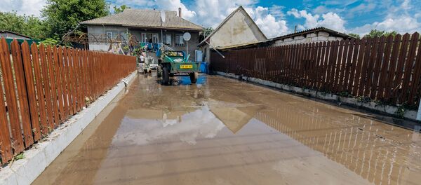 Urmările ploilor torențiale și inundațiilor în raionul Ialoveni. - Sputnik Молдова