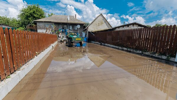Urmările ploilor torențiale și inundațiilor în raionul Ialoveni. - Sputnik Молдова