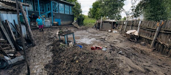 Urmările ploilor torențiale și inundațiilor în raionul Ialoveni. - Sputnik Молдова