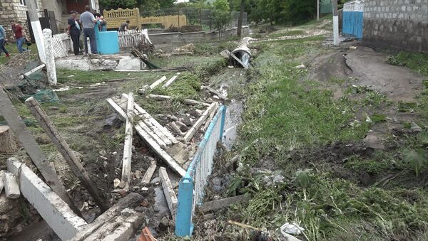 Проливные дожди нанесли серьезный ущерб жителям Яловенского района - Sputnik Молдова