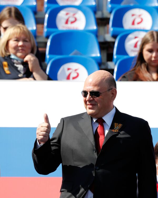 Председатель правительства РФ Михаил Мишустин на параде Победы в Моске - Sputnik Молдова