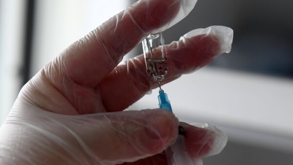 Работа мобильных пунктов вакцинации в Казани - Sputnik Молдова