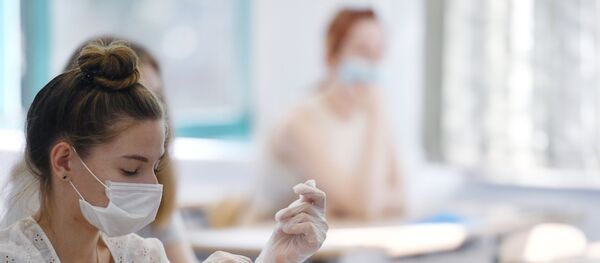 Сдача ЕГЭ по литературе в Москве - Sputnik Молдова