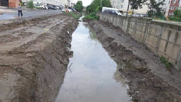 Consecințele ploii torențiale în Chișinău  - Sputnik Молдова