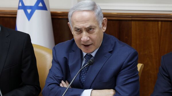 Israeli Prime Minister Benjamin Netanyahu chairs the weekly cabinet meeting at the Prime Minister's office in Jerusalem, Sunday, April 15, 2018 - Sputnik Moldova-România
