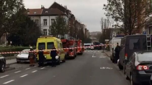 СПУТНИК_Полиция в поисках предполагаемого террориста перекрыла улицу в Брюсселе - Sputnik Moldova