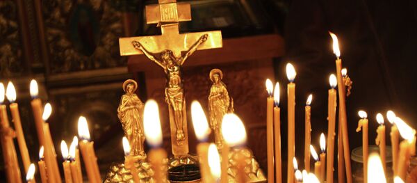 Распятие и свечи - Sputnik Moldova