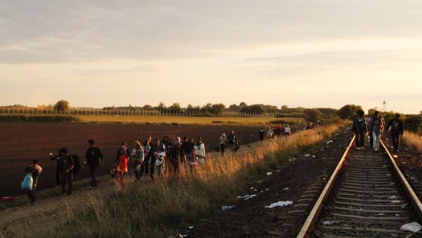 Беженцы на границе - Sputnik Молдова