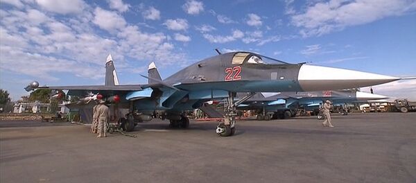 СПУТНИК_Авиатехники проверили ракеты &quot;воздух-воздух&quot; на Су-34 перед вылетом в Сирии - Sputnik Молдова