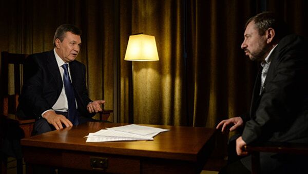 Бывший президент Украины Виктор Янукович и Захар Виноградов - Sputnik Молдова