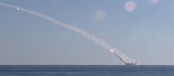 СПУТНИК_Удары по ИГ с подлодки &quot;Ростов-на-Дону&quot;: доклад Шойгу и кадры пуска ракет - Sputnik Молдова