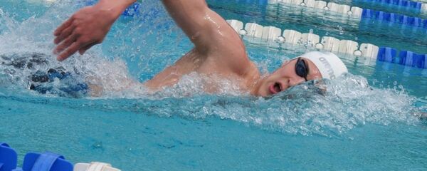 Молдавский пловец Алексей Саньков - Sputnik Молдова