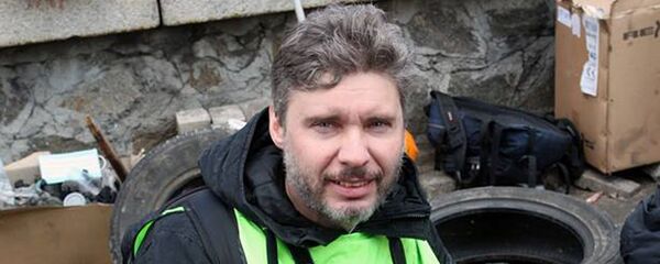 Специальный фотокорреспондент МИА Россия сегодня Андрей Стенин - Sputnik Молдова