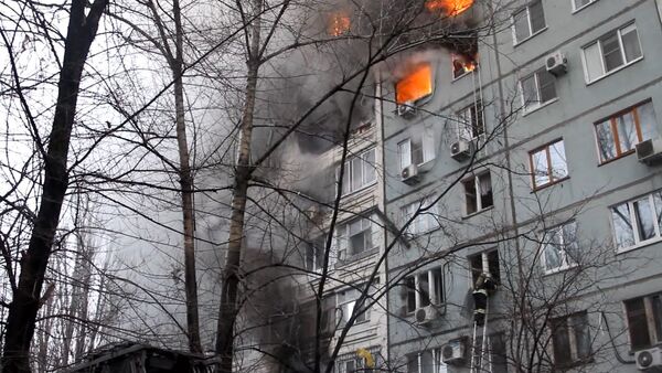 СПУТНИК_Работа пожарных и спасателей на месте взрыва газа в жилом доме в Волгограде - Sputnik Молдова