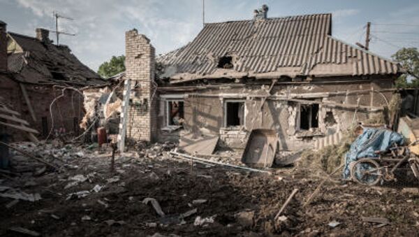 Последствия обстрела Горловки в Донецкой области - Sputnik Молдова
