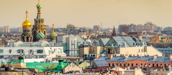 Вид на Исаакиевский собор и крыши Санк-Петербурга Вид на Исаакиевский собор и крыши Санк-Петербурга - Sputnik Молдова