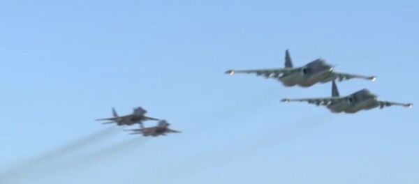 СПУТНИК_Совместный боевой вылет российских Су-25 и сирийских МиГ-29 с базы Хмеймим - Sputnik Молдова