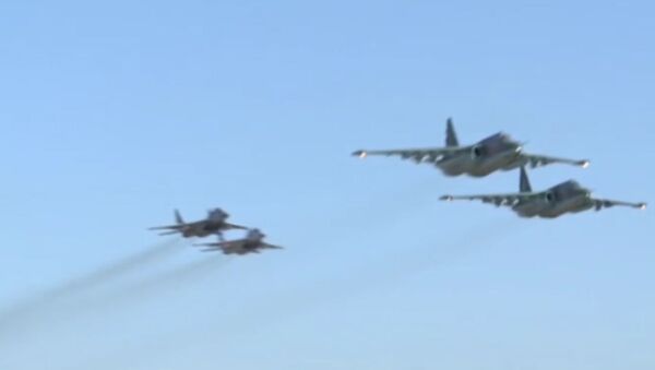 СПУТНИК_Совместный боевой вылет российских Су-25 и сирийских МиГ-29 с базы Хмеймим - Sputnik Молдова