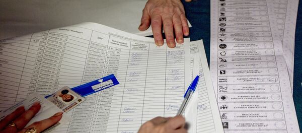 На одном из избирательных участков в Кишиневе, архивное фото. На одном из избирательных участков в Кишиневе, архивное фото. - Sputnik Молдова
