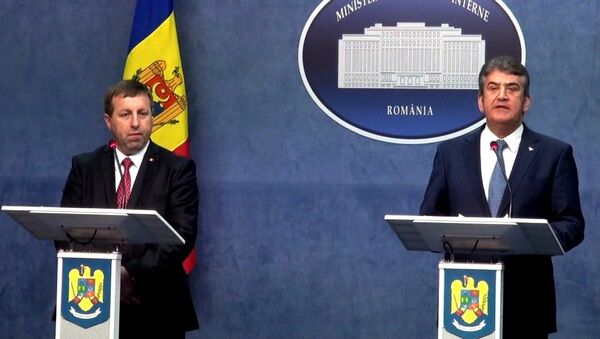 Министр внутренних дел Молдовы Олег Балан и глава МВД Румынии Габриел Опря - Sputnik Moldova