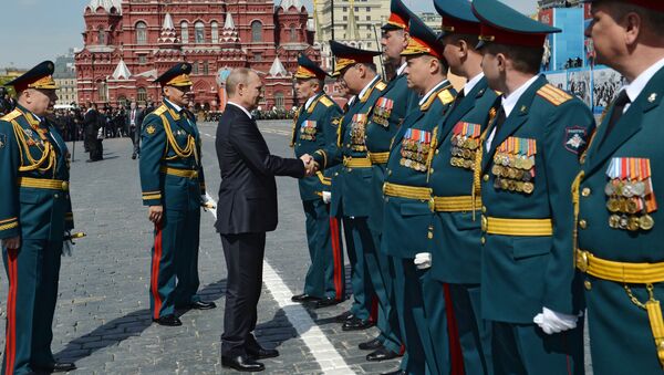 Президент РФ В.Путин на военном параде в честь 70-й годовщины Победы в ВОВ. Armata Rusiei - Sputnik Moldova-România