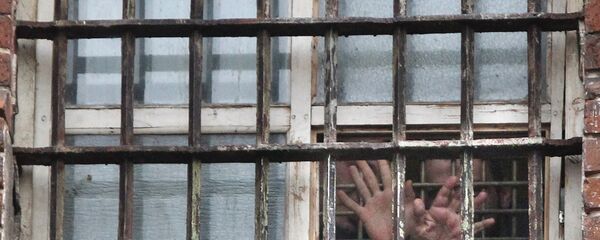 Prisoners in the prison window - Sputnik Молдова