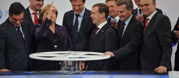 Д.Медведев на церемонии пуска трубопровода Северный поток. Angela Merkel şi Dmitri Medvedev, ceremonia de inaugurare a zadoductului North Stream. - Sputnik Moldova