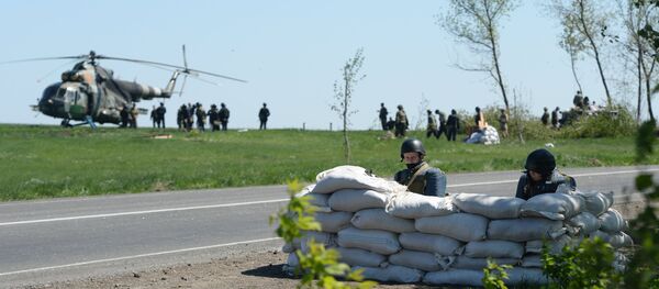 Post militar, estul Ucrainei. Блокпост украинской армии в окрестностях Славянска - Sputnik Moldova