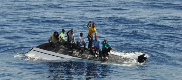 Inmigrantes ilegales en el Mediterráneo (Archivo) - Sputnik Молдова