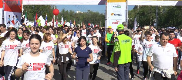 Измеряли бег по чипу - в Кишиневе прошел международный марафон Измеряли бег по чипу - в Кишиневе прошел международный марафон - Sputnik Молдова