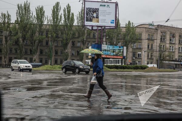 Niciodată ploaia nu este o noutate pentru locuitorul din Chișinău, el ştie întotdeauna: capriciile naturii nu se termină cu bine - Sputnik Moldova
