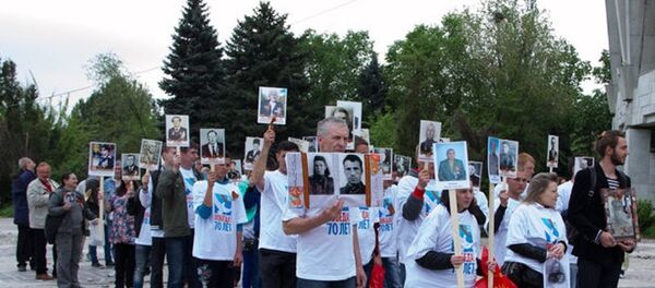 Марш По следам Алексея Бельского и сеанс связи с Международной космической станцией состоялись в четверг в Кишиневе в преддверии празднования 70-летия Победы в Великой Отечественной войне. - Sputnik Молдова