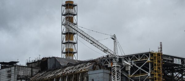 Саркофаг над четвертым энергоблоком Чернобыльской АЭС. - Sputnik Молдова