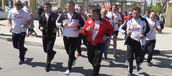 В Оргееве чиновники пробежали кросс от стадиона к центру города В Оргееве чиновники пробежали кросс от стадиона к центру города - Sputnik Молдова