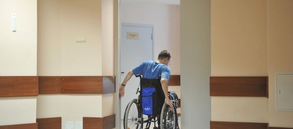 Bărbat în scaun cu rotile - Sputnik Moldova