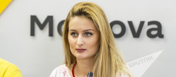 Лидия Исак в пресс-центре Sputnik Молдова Лидия Исак в пресс-центре Sputnik Молдова - Sputnik Молдова
