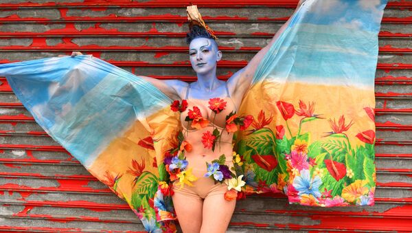 Участница 33го ежегодного Mermaid Parade в Нью-Йорке - Sputnik Молдова
