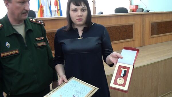 Медаль Вооруженных Сил Сирии вручена вдове российского матроса Позынича - Sputnik Молдова