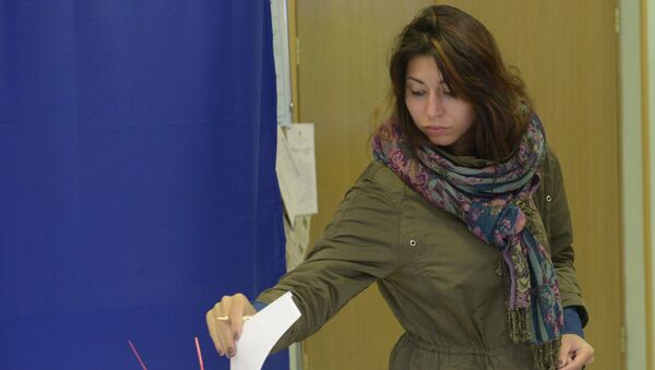 Голосование на выборах. Архивное фото - Sputnik Молдова