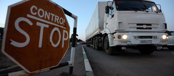 A truck carrying humanitarian aid for people in southeastern Ukraine at the Donetsk checkpoint. - Sputnik Moldova