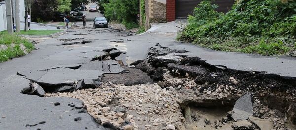 Асфальт наизнанку: в Кишиневе прошел сильнейший ливень - Sputnik Молдова