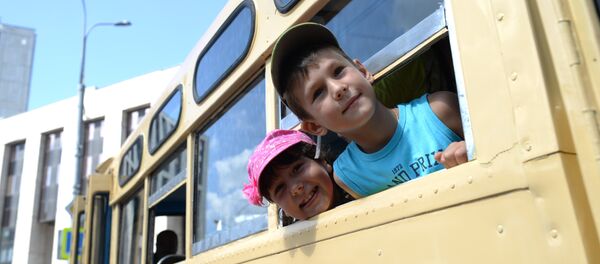 Transport public, copii, pasageri, oraș Transport public, copii, pasageri, oraș - Sputnik Moldova