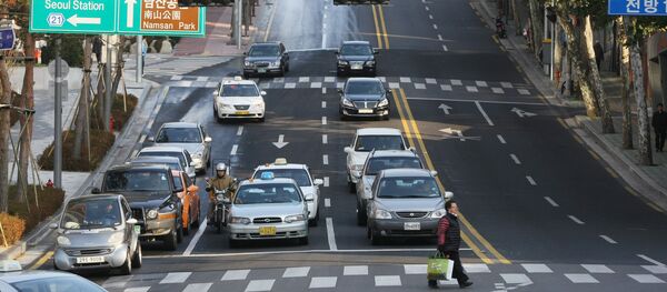 Движение транспорта в центре Сеула. Движение транспорта в центре Сеула. - Sputnik Молдова