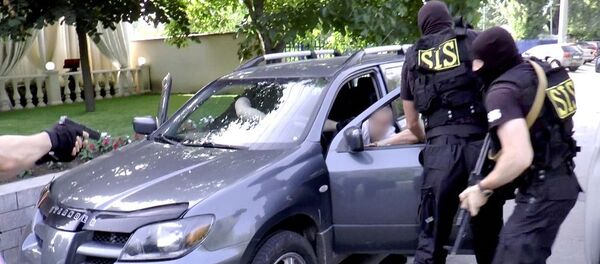 Операция по задержанию, реализуемая сотрудниками СИБ - Sputnik Молдова