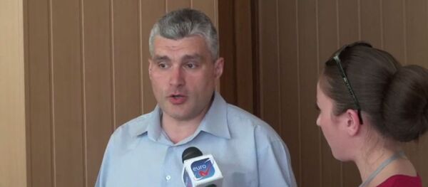 Alexandru Slusari Alexandru Slusari - Sputnik Moldova