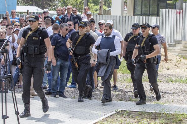 Ilan Șor escortat la Curtea de Apel Chișinău Ilan Șor escortat la Curtea de Apel Chișinău - Sputnik Moldova