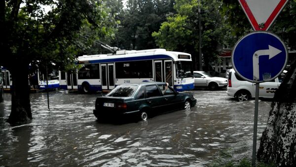 Strada Calea Ieșilor din capitală după ploaia din 03 iulie 2016 - Sputnik Moldova