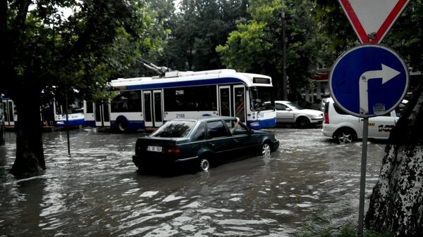 Strada Calea Ieșilor din capitală după ploaia din 03 iulie 2016 Strada Calea Ieșilor din capitală după ploaia din 03 iulie 2016 - Sputnik Moldova
